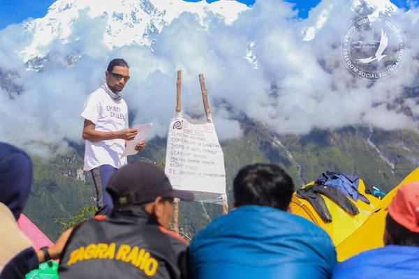 Jagan Timilsina, founder of the Outdoor Education Project, teaches a lesson in the mountains of rural Nepal