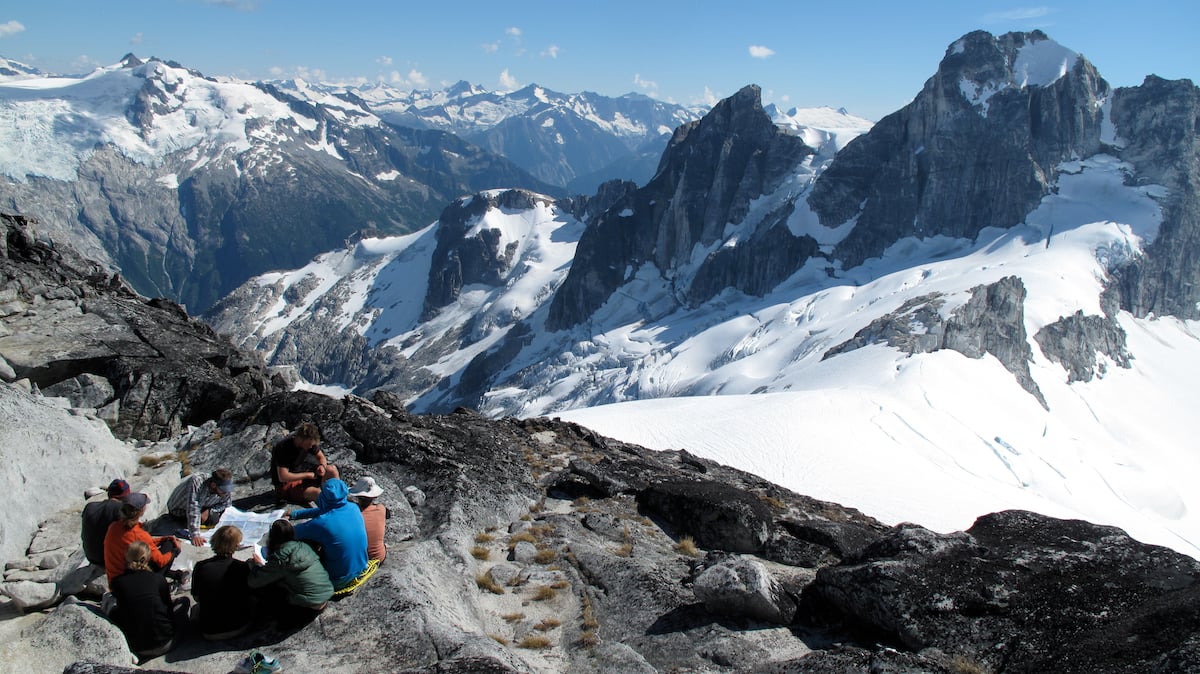 NOLS students circle up for a lesson in the mountains of the Pacific Northwest